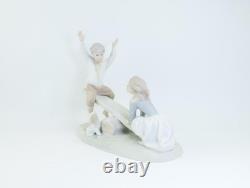 Nao by Lladro Porcelain Figurine Children, Dog on Seesaw, Matte Finish