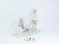 Nao by Lladro Porcelain Figurine Children, Dog on Seesaw, Matte Finish