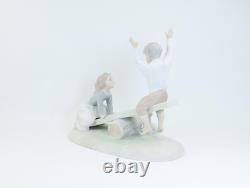 Nao by Lladro Porcelain Figurine Children, Dog on Seesaw, Matte Finish