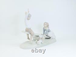 Nao by Lladro Porcelain Figurine Children, Dog on Seesaw, Matte Finish