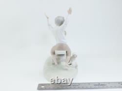Nao by Lladro Porcelain Figurine Children, Dog on Seesaw, Matte Finish