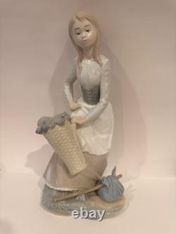 Nao by Lladro Porcelain Figurine Girl with Basket, Excellent Condition