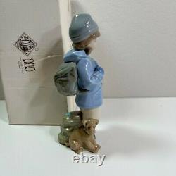 Nao by Lladro Spain school boy and his dog