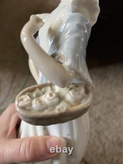 Nao by Lladro Spanish Porcelain Figurine, Girl with a Basket of Roses, 13 1/4