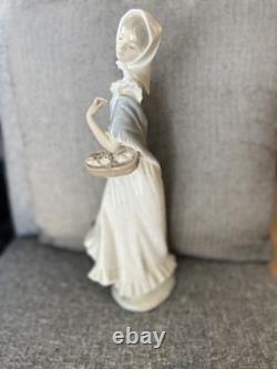 Nao by Lladro Spanish Porcelain Figurine, Girl with a Basket of Roses, 13 1/4
