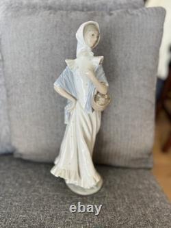 Nao by Lladro Spanish Porcelain Figurine, Girl with a Basket of Roses, 13 1/4