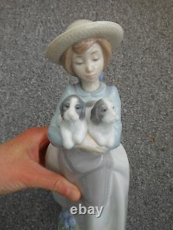Nao by Lladro figure girl holding two puppies called what an armfull number 1156