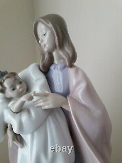 Nao by Lladro pottery figure of a Lady holding a baby in a blanket 13 1/4 inches