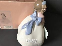 Nao by Lladro young lady with a hat. Original box. Free shIpping