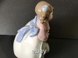 Nao by Lladro young lady with a hat. Original box. Free shIpping