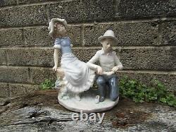 Old Nao Lladro Large porcelain figure of a young boy and girl