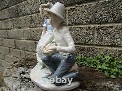 Old Nao Lladro Large porcelain figure of a young boy and girl