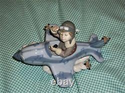 RETIRED Lladro OVER THE CLOUDS 5697 BOY AIRPLANE BIRDS SKY