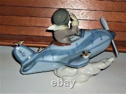 RETIRED Lladro OVER THE CLOUDS 5697 BOY AIRPLANE BIRDS SKY