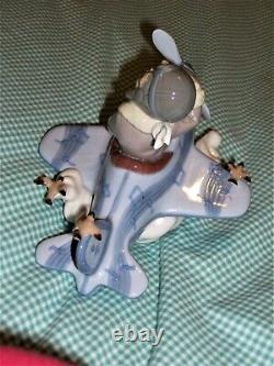 RETIRED Lladro OVER THE CLOUDS 5697 BOY AIRPLANE BIRDS SKY