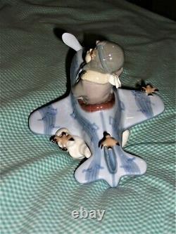 RETIRED Lladro OVER THE CLOUDS 5697 BOY AIRPLANE BIRDS SKY