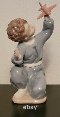 RETIRED NAO LLADRO JET PILOT #1133 BOY w TOY PLANE AIRPLANE PORCELAIN FIGURINE