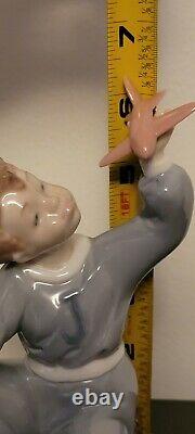 RETIRED NAO LLADRO JET PILOT #1133 BOY w TOY PLANE AIRPLANE PORCELAIN FIGURINE