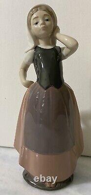 Retired NAO-Hand Made in Spain by Lladro Girl Touching Hair 9.5 Inches Tall