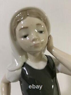 Retired NAO-Hand Made in Spain by Lladro Girl Touching Hair 9.5 Inches Tall