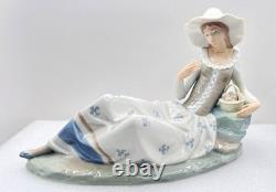 Retired NAO by Lladro Figurine Languid Lady Seated with Flowers Fruit Basket