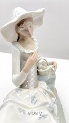Retired NAO by Lladro Figurine Languid Lady Seated with Flowers Fruit Basket