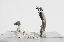 Set of Two Figurines Lladro Golfer, Waiting To Tee Off and Nao Amusing Ballet