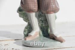 Set of Two Figurines Lladro Golfer, Waiting To Tee Off and Nao Amusing Ballet