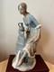 Spanish-made LLADRO NAO ceramic figurine of a woman drawing water, 3