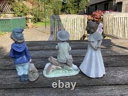 Three Lladro Nao Figures So Shy Girl With Rucksack Boy With Sheep Flute Missing