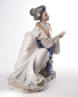 Vintage 20th Porcelain figure NAO by Lladro Geisha with a musical instrument
