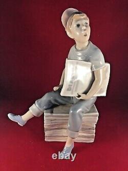 Vintage Lladro Nao Spain Boy Sitting on Newspapers Papers Figurine Figure