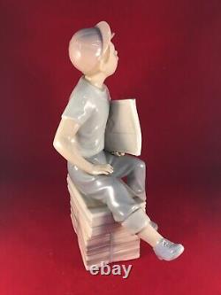 Vintage Lladro Nao Spain Boy Sitting on Newspapers Papers Figurine Figure