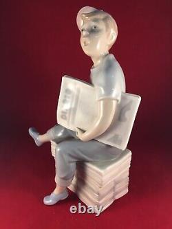 Vintage Lladro Nao Spain Boy Sitting on Newspapers Papers Figurine Figure