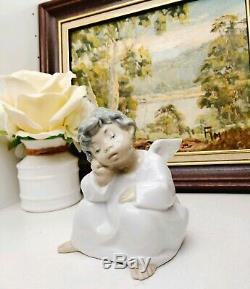 Vintage Lladro Porcelain Figurine Angel Thinkingera 1965-1970 from date Mark