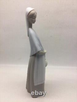 Vintage NAO By Lladro Woman Holding Bundle Porcelain Figure