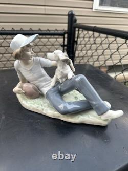 Vintage Nao by Lladro porcelain figurine titled Boy With Dog And Football 1985