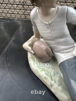 Vintage Nao by Lladro porcelain figurine titled Boy With Dog And Football 1985