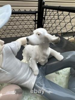 Vintage Nao by Lladro porcelain figurine titled Boy With Dog And Football 1985