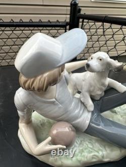 Vintage Nao by Lladro porcelain figurine titled Boy With Dog And Football 1985