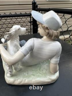 Vintage Nao by Lladro porcelain figurine titled Boy With Dog And Football 1985