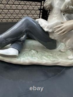 Vintage Nao by Lladro porcelain figurine titled Boy With Dog And Football 1985