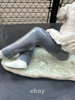 Vintage Nao by Lladro porcelain figurine titled Boy With Dog And Football 1985