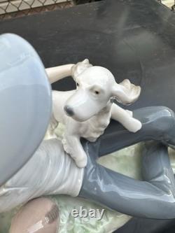 Vintage Nao by Lladro porcelain figurine titled Boy With Dog And Football 1985
