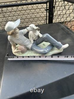 Vintage Nao by Lladro porcelain figurine titled Boy With Dog And Football 1985