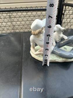 Vintage Nao by Lladro porcelain figurine titled Boy With Dog And Football 1985