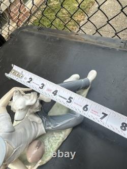 Vintage Nao by Lladro porcelain figurine titled Boy With Dog And Football 1985